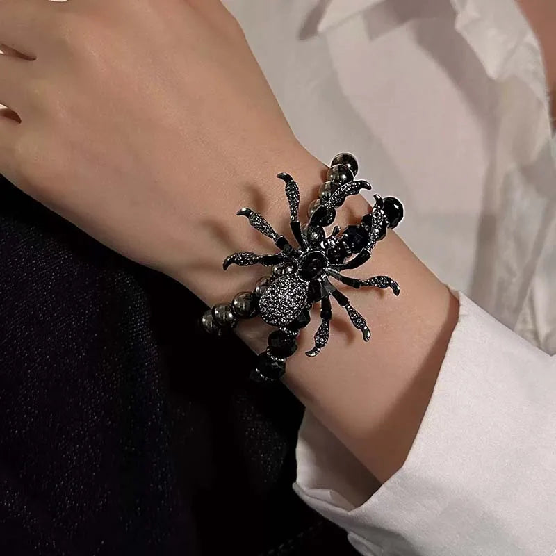 Black spider bracelet on a wrist Halloween