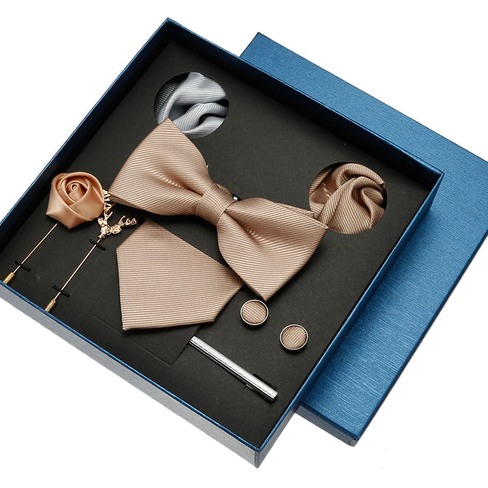 Bow tie set with accessories in a blue box