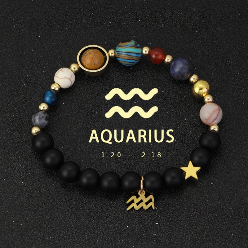 Bracelet with Aquarius symbol and bead charms on a black background