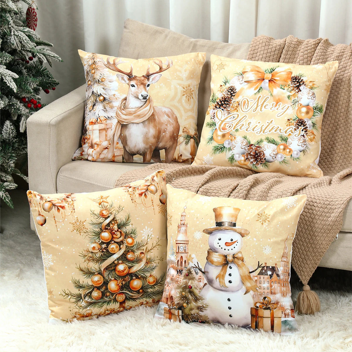Decorative Christmas pillows on a couch with festive designs.