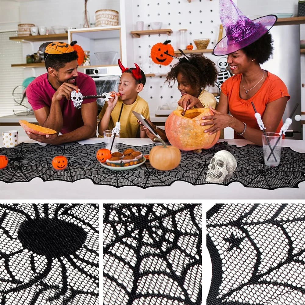 Family preparing pumpkins for Halloween with a spider web tablecloth.