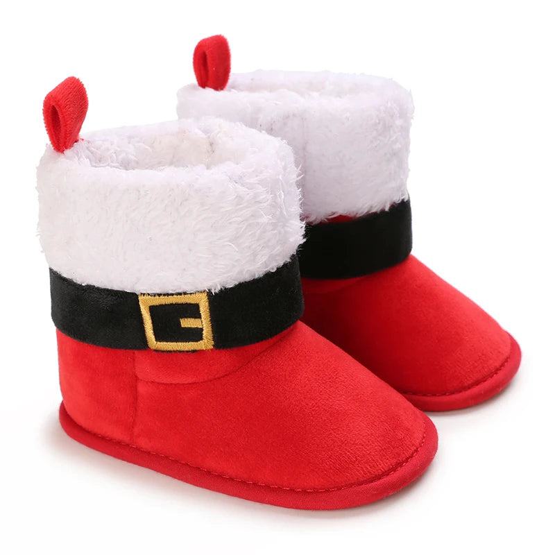 Red and white baby Santa Claus boots with black belts and red buttons on a white background