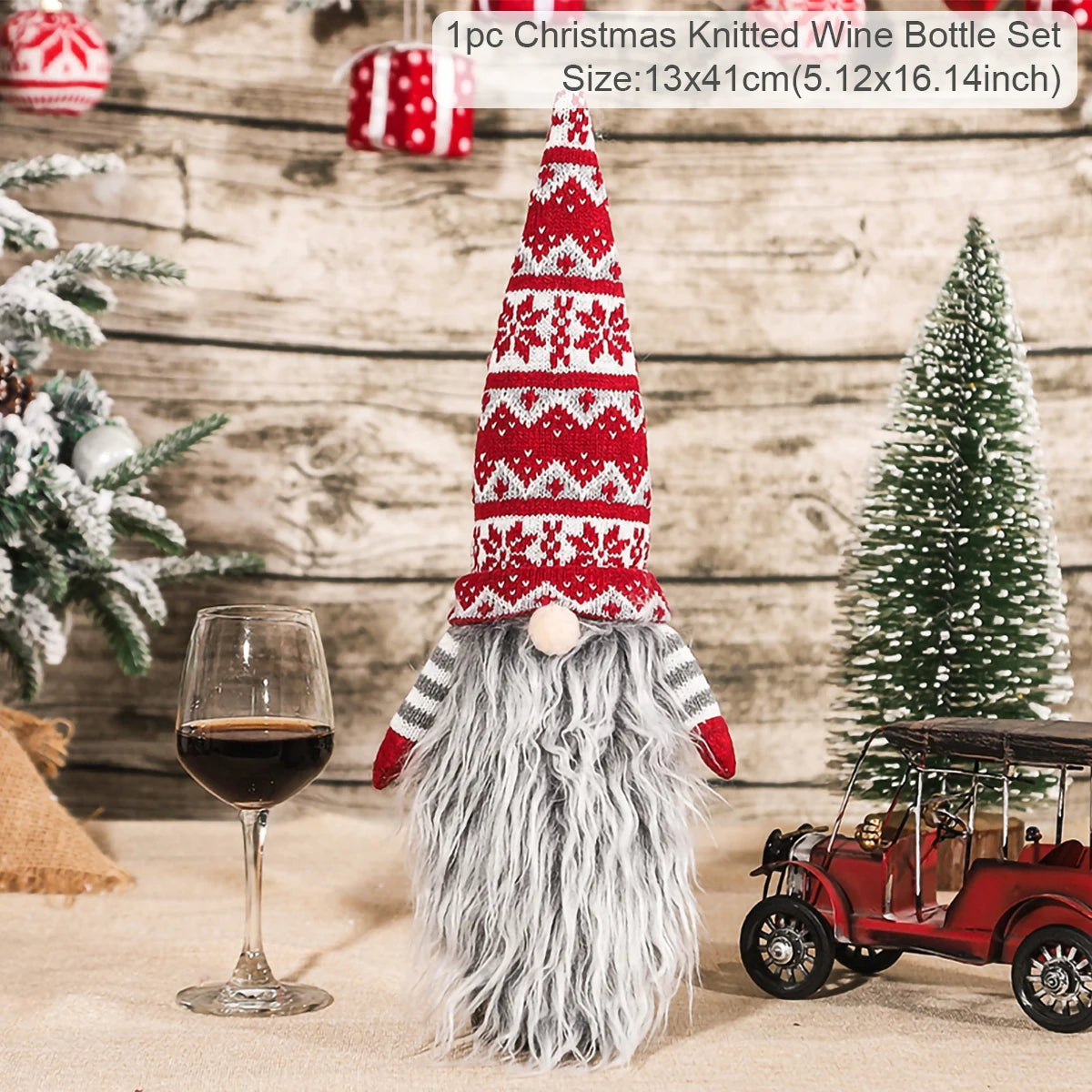 Christmas-themed gnome with a wine bottle cover, wine glass, and small Christmas tree in the background.