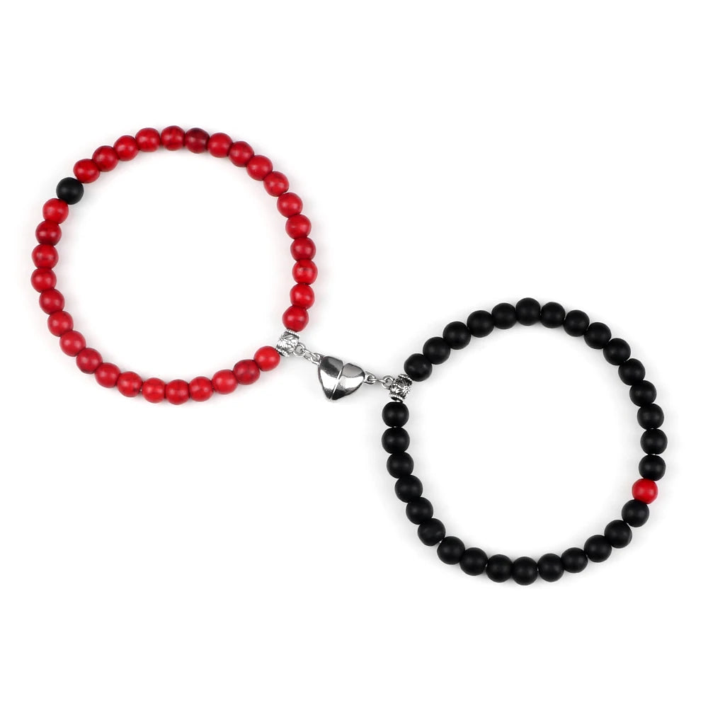 Red and black beaded matching  bracelets on a white background.