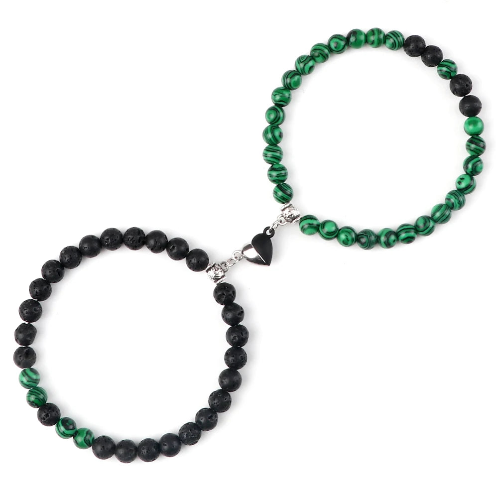 Black and green bracelet set on a white background.