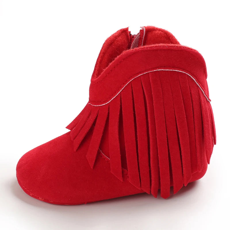 Red fringed boot on a white background
