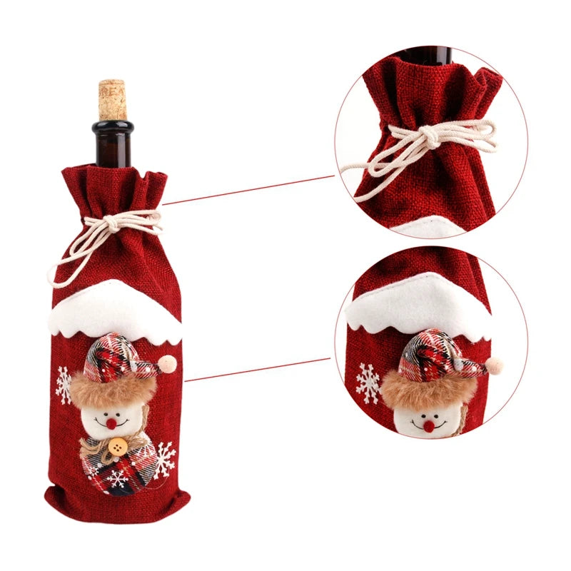 Red wine bottle cover with snowman design on a white background