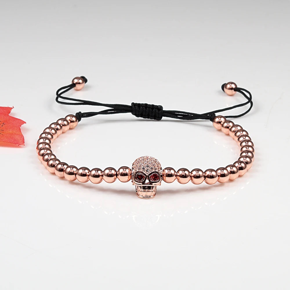 Rose gold beaded bracelet with a skull charm