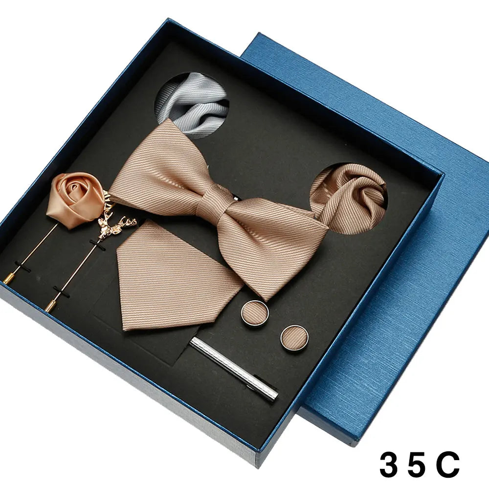 Sand bow tie set with accessories in a blue box