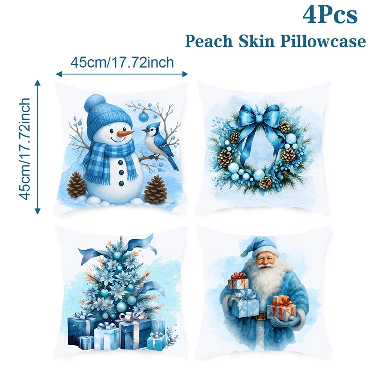 Four blue pillowcases with Christmas-themed designs on a white background.