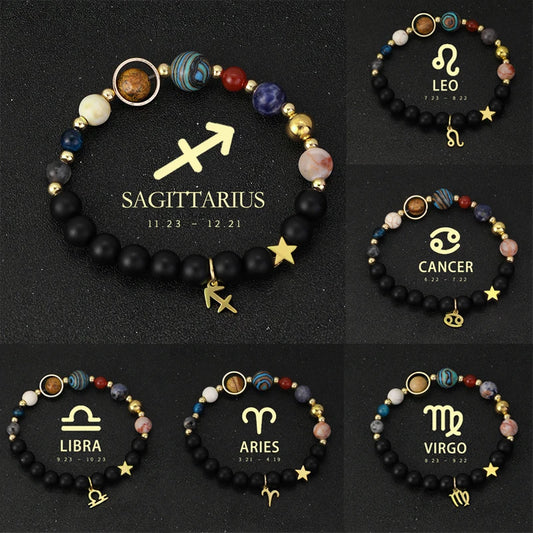 Set of zodiac-themed bracelets on a black background